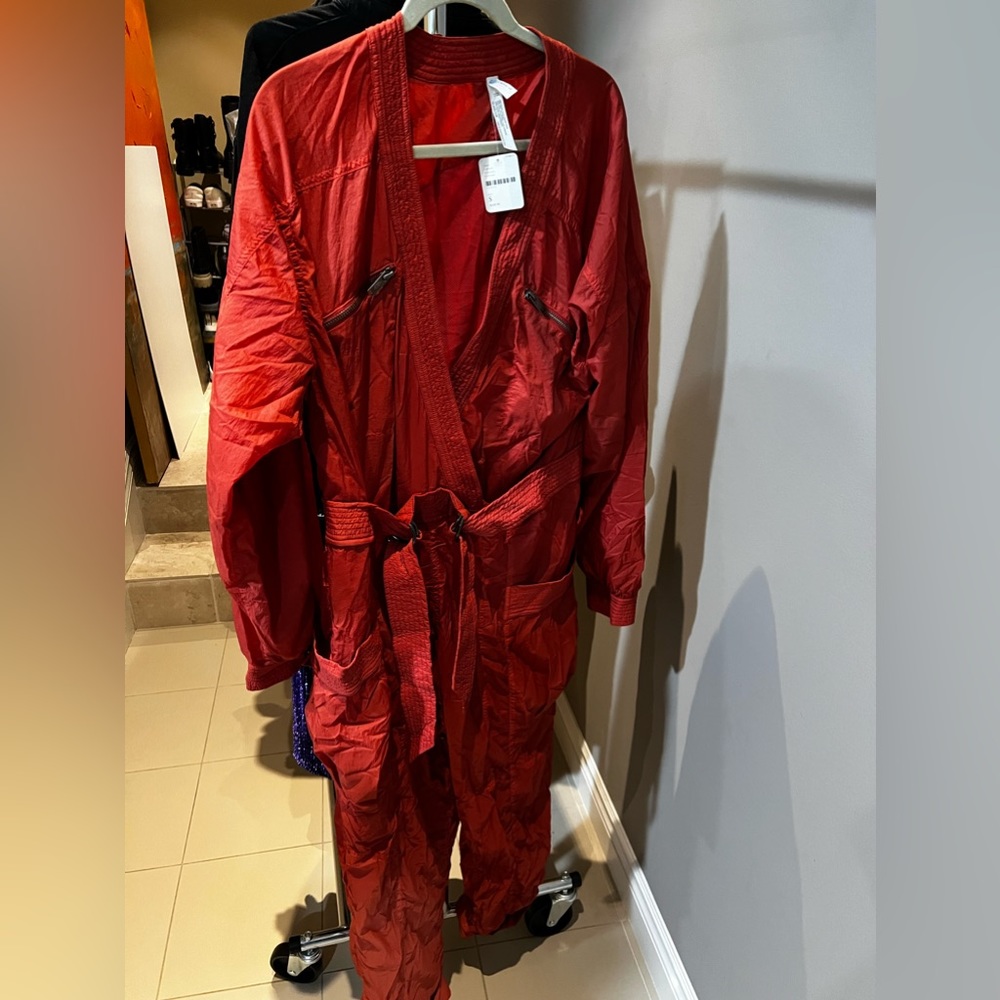 FP movement rain coat jumpsuit